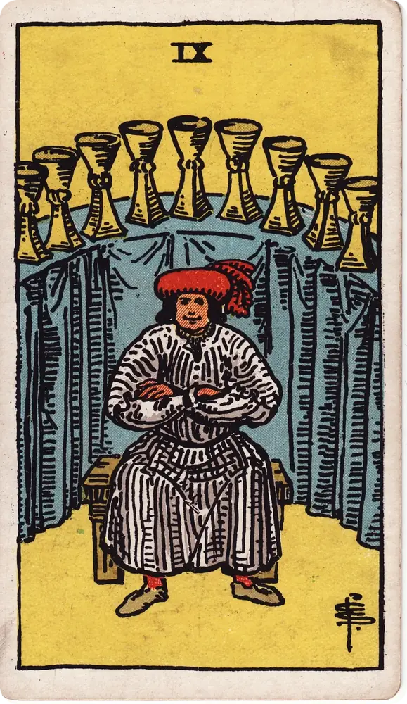 The cleaned Rider–Waite–Smith Nine of Cups tarot card